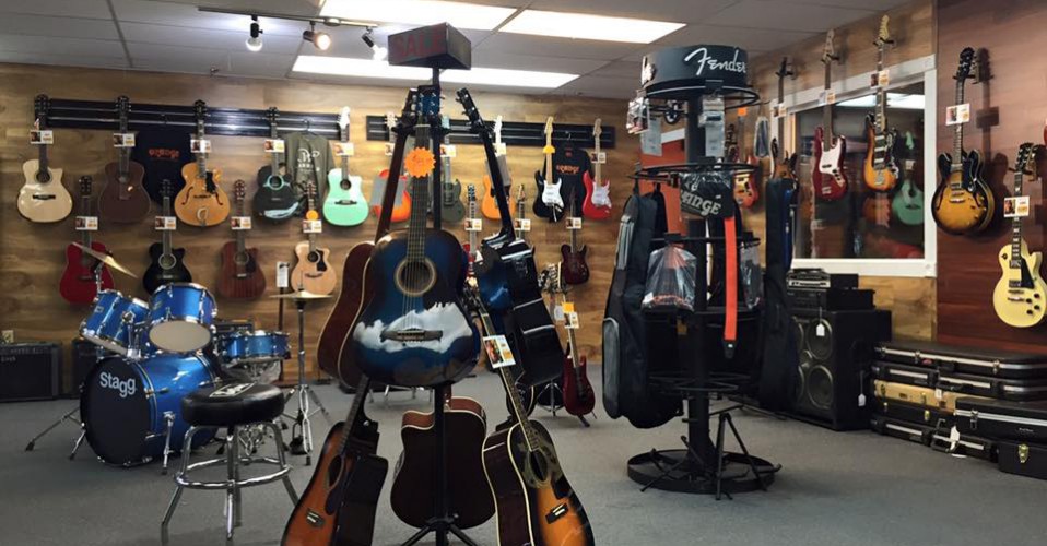 Electric guitars, acoustic guitars, amps, amplifiers, guitar accessories at Family Music store in Louisville, KY