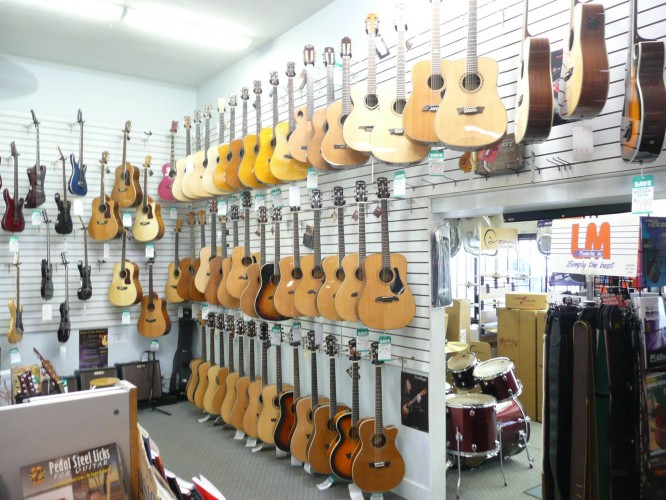 Acoustic guitars at A Plus Guitar music store in Bridgeport, West Virginia