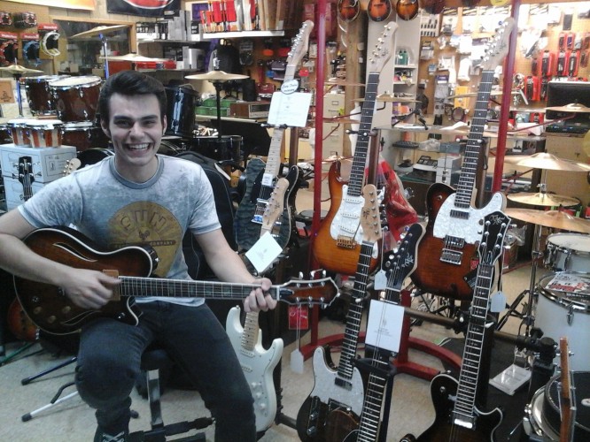 Michael Kelly Hybrid acoustic-electric guitar at Stan Herbert's Music Shoppe in Hammond, LA