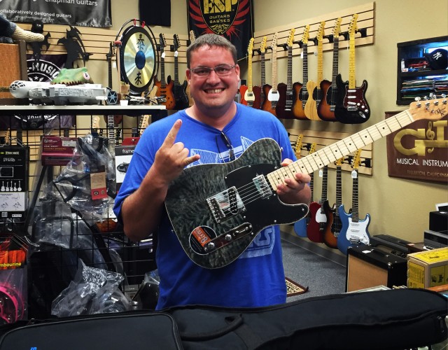 Happy Michael Kelly customer at Flipside Music