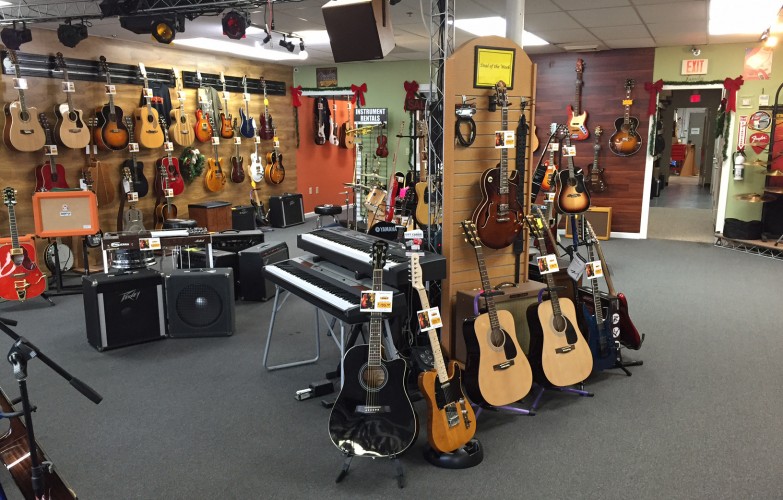 Electric guitars, acoustic guitars, amps, amplifiers, guitar accessories at Family Music store in Louisville, KY