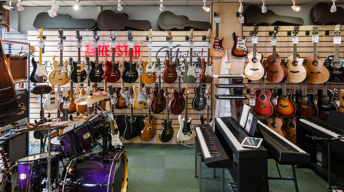 Electric and acoustic guitars at Strum & Bass music store Electric and acoustic guitars at Strum & Bass music store