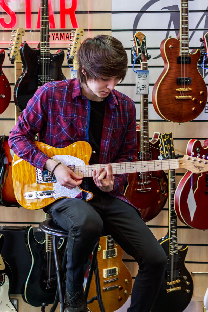 Playing a Michael Kelly 1950 guitar Playing a Michael Kelly 1950 guitar