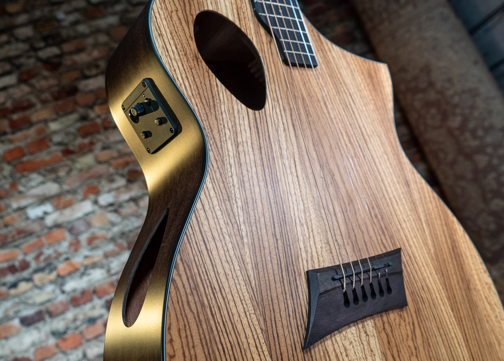 angled view of acoustic guitar body