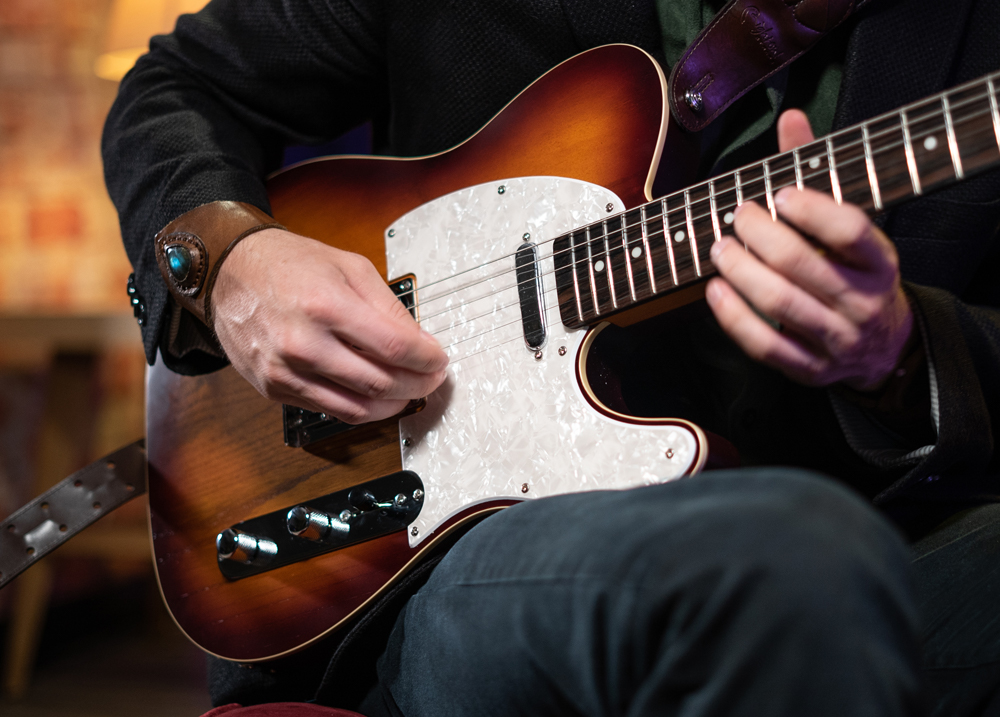 angled view of electric guitar body