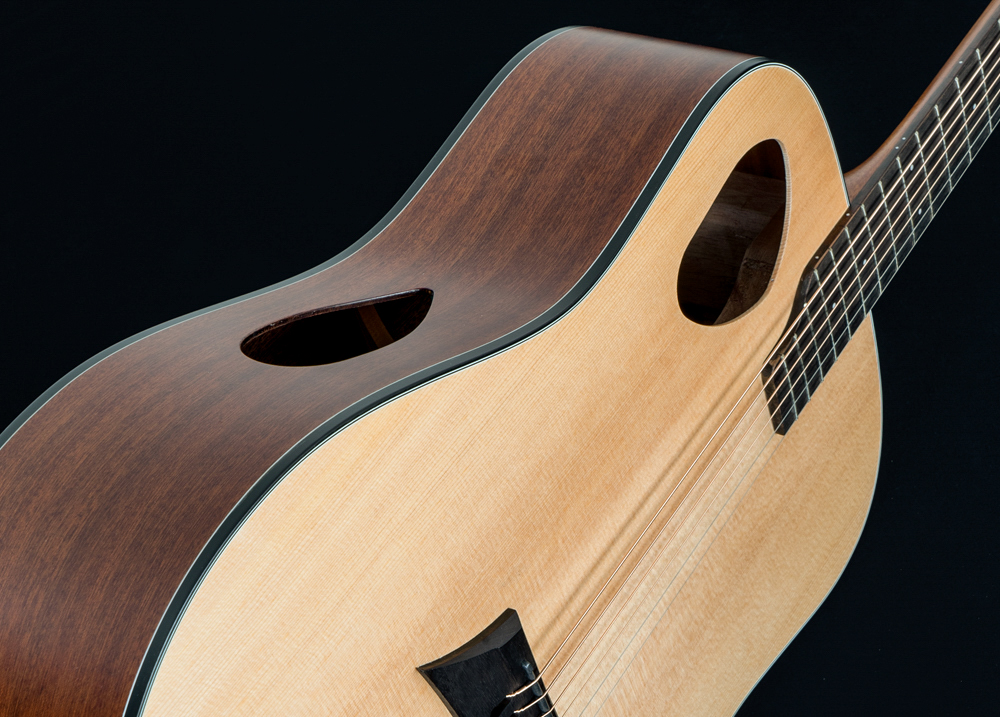 angled top view of acoustic guitar body
